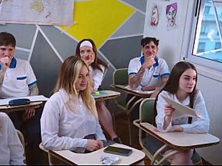 Tattooed babe gets a sloppy blowjob in the classroom