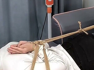 The Extreme Restraints of a Barefoot Girl, Playing with Her Bare Feet