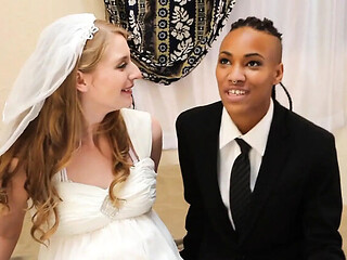 Ebony and Blonde Lesbians in Strapon Wedding Night Fun
