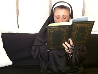 Naughty Nun Smokes a Cigarette Behind Her Bible in Church