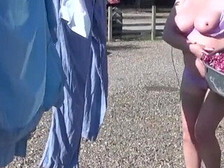Trisha hanging out the washing