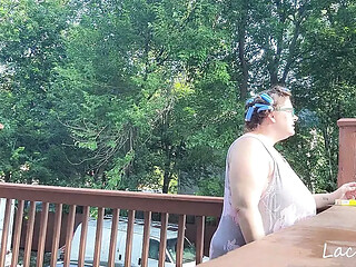 Hot milf smokes and shows off her natural big tits in curlers